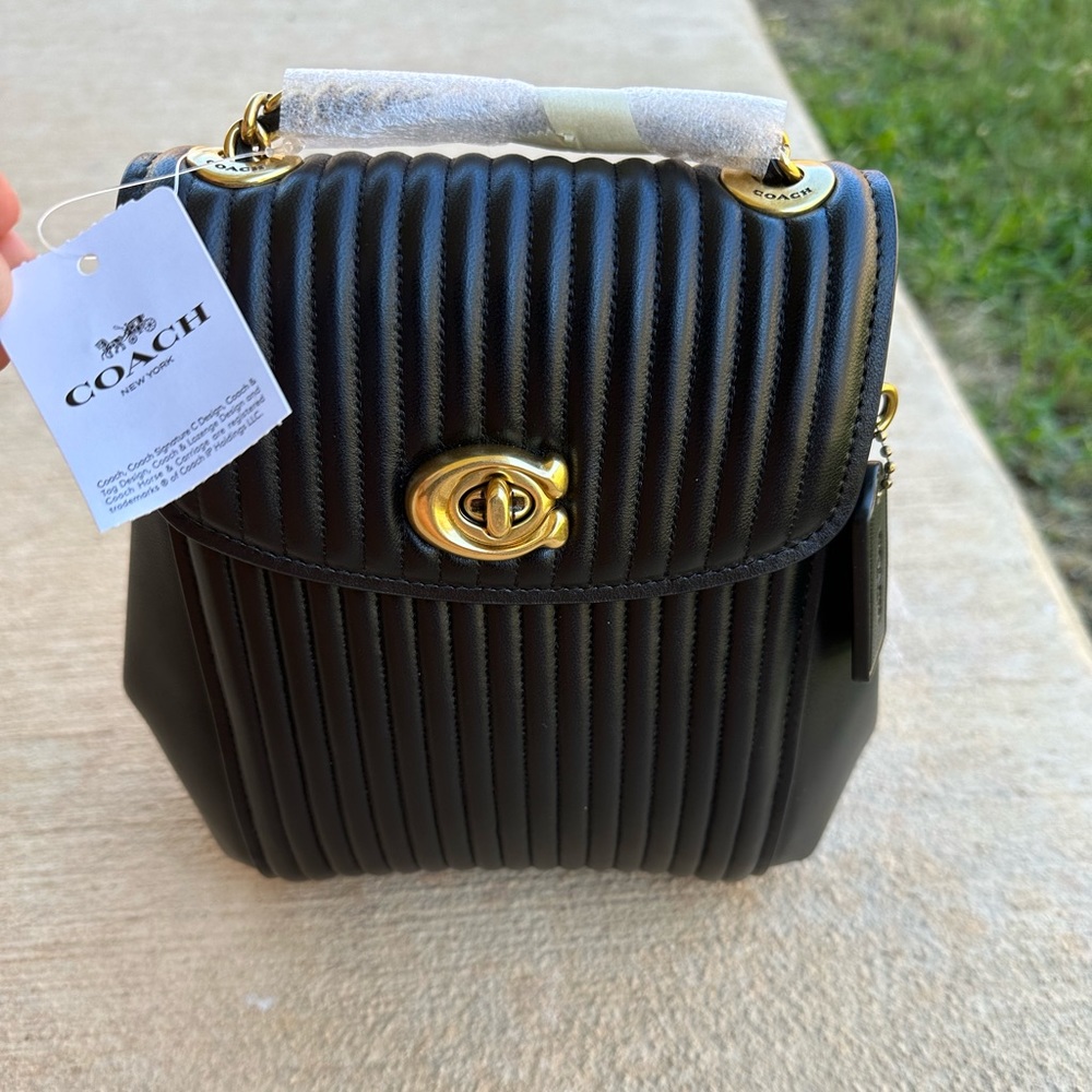 One of kind crossbody/backpack and shoulder bag.
